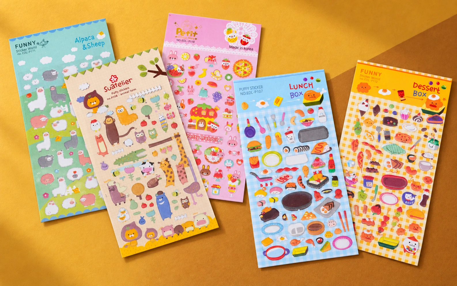 Five puffy sticker sheets featuring animal and food designs.