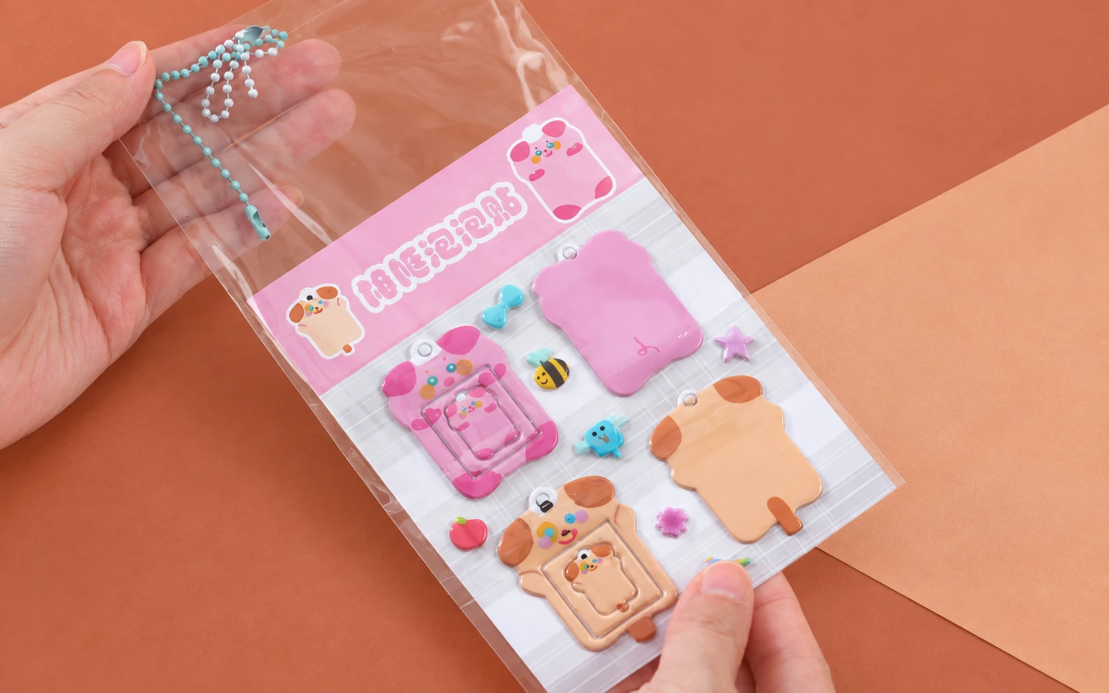Animal-shaped puffy sticker set in a clear plastic bag with a printed backing card.