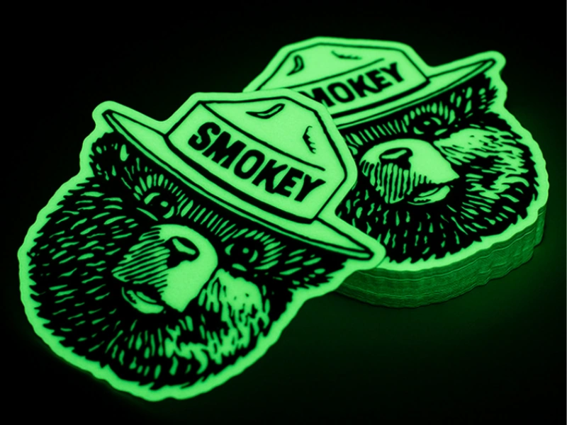 Custom die-cut glow-in-the-dark vinyl stickers with green afterglow