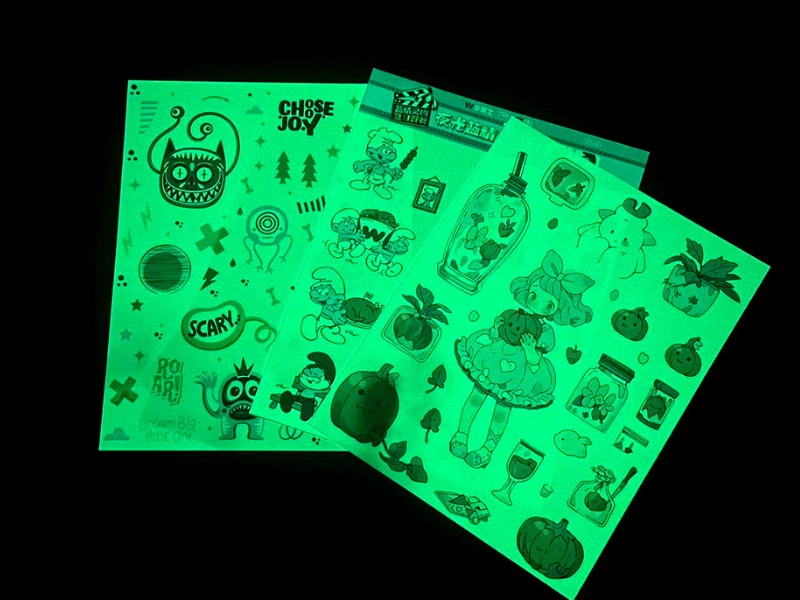 Custom glow-in-the-dark sticker sheets with multiple kiss-cut designs